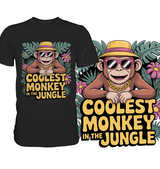 Schwarzes T-Shirt mit Affe mit Sonnenbrille und Hut, und Text „Coolest Monkey in the Jungle“. Rechts vergrößerte Darstellung des Affen-Motivs